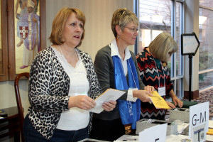 Becky VanPool, Mary Ann Schmitt and Charlene Smith at the registration table